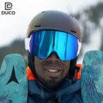 DUCO Ski Goggles with Magnetic Lens for Snowboard, Anti-Fog UV400 Protection Over Glasses OTG Snow Sports Goggles DCS002 (White Frame Revo Blue+Revo Red Lens)